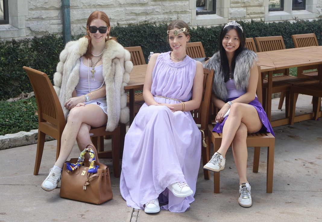 Seniors Corbin Robinson, Lyall Wight and Sophia Hung pulled out their purple ball gowns and faux fur coats for Dress like Kinkaid Day.