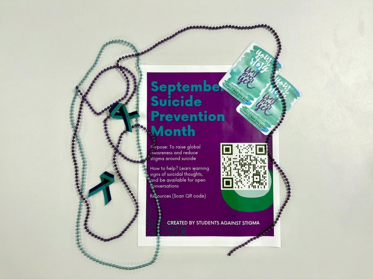Students Against Stigma passed out resources in purple and teal, the colors for Suicide Prevention Awareness Month.

