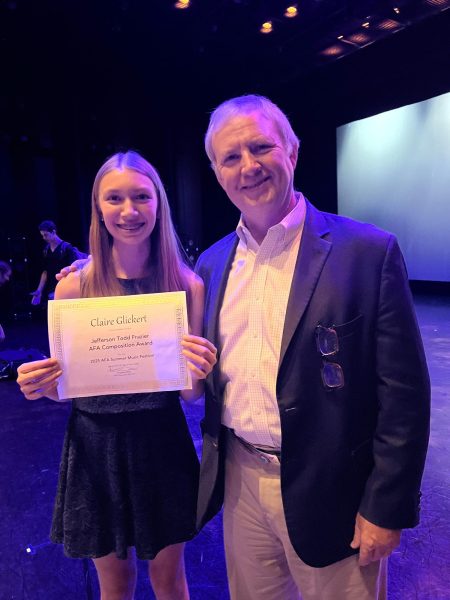 Claire Glickert holds the Jefferson Todd Frazier American Festival of the Arts Composition award. She is standing next to Jefferson Todd Frazier, the founder of AFA. Courtesy of Claire Glickert.