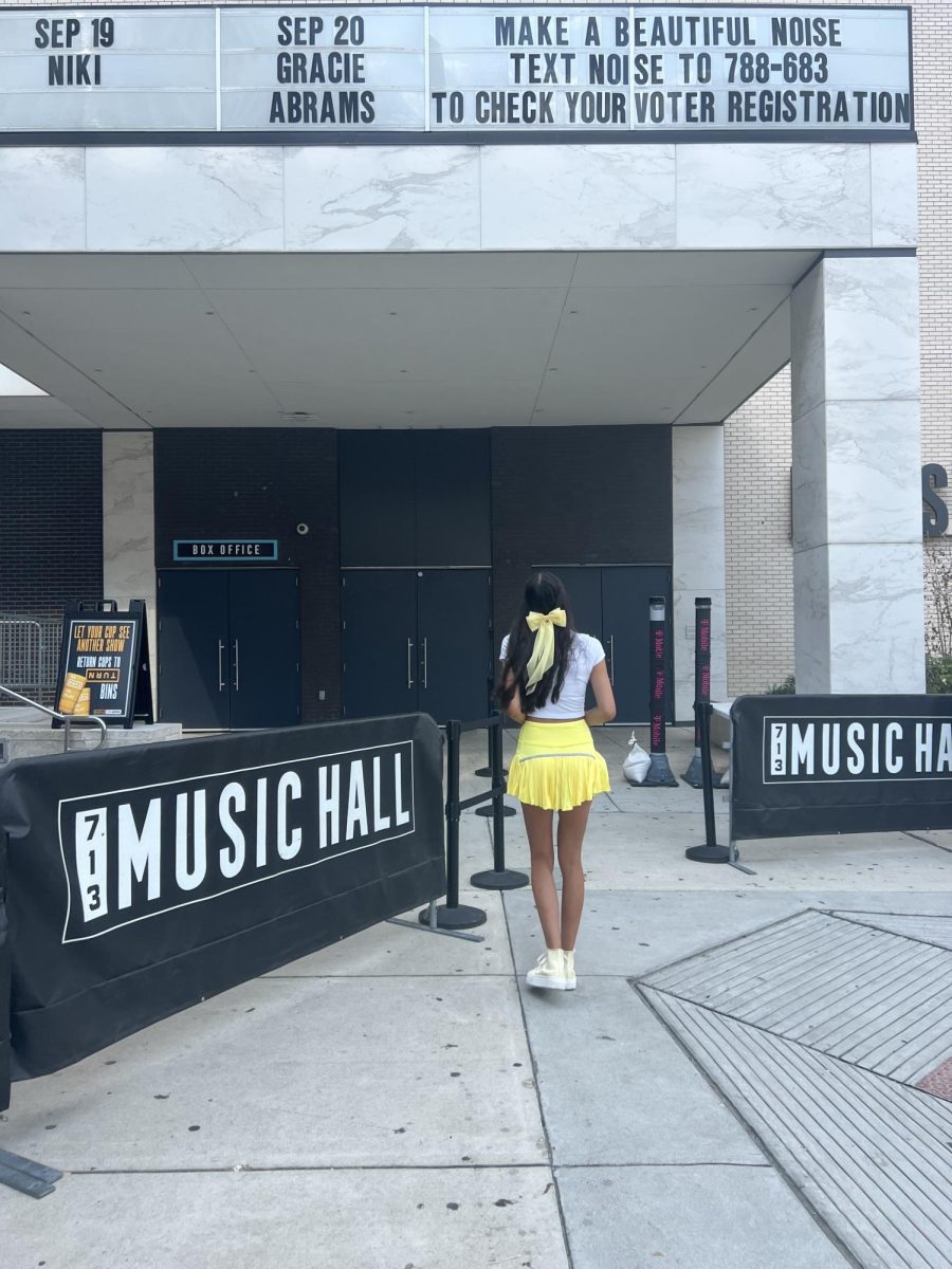 Senior Sonia Chilukuri stands outside of 713 Music Hall, a concert venue that sells tickets through Ticketmaster. Courtesy of Sonia Chilukuri.