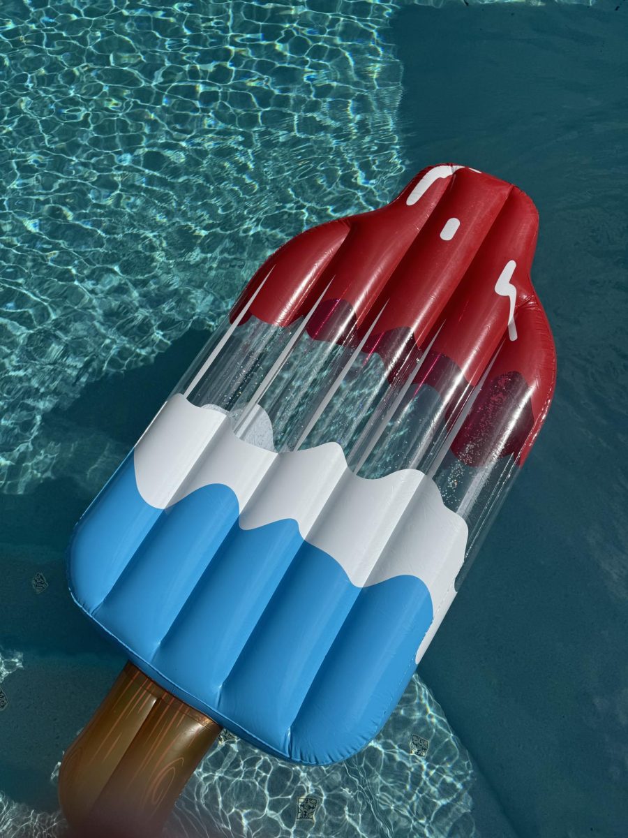Dressed in red, white and blue, this popsicle pool floaty is a staple for any summer party.